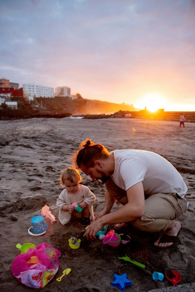 Photo by Tatiana Syrikova: https://www.pexels.com/photo/father-and-child-playing-on-a-sandy-beach-at-sunset-3968119/